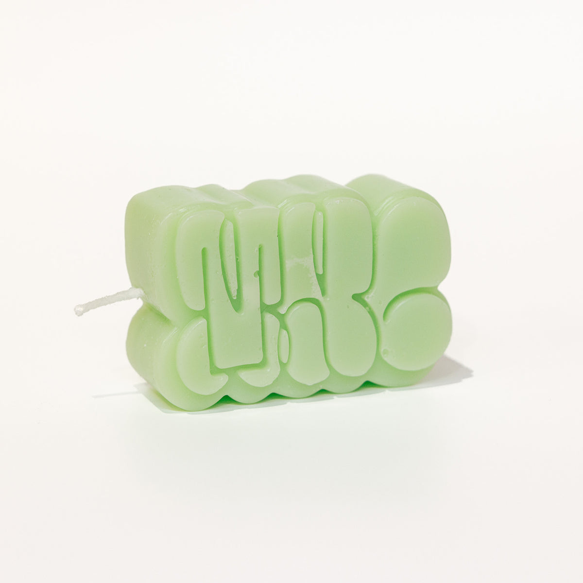 MNC Throw-up Logo Candle