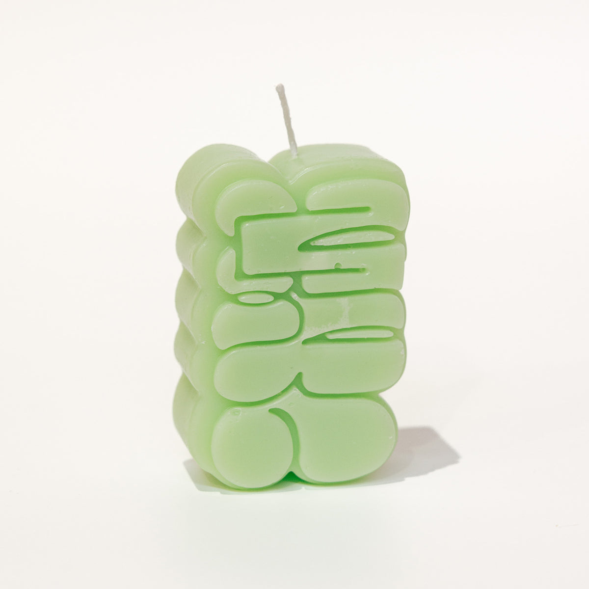 MNC Throw-up Logo Candle